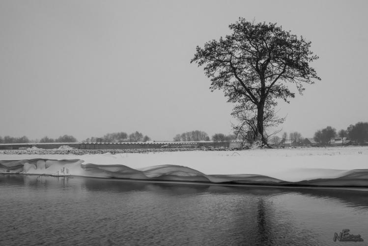 Snow down the ditch side.