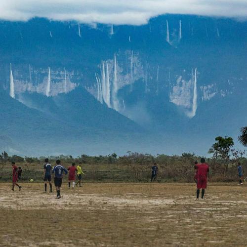 Would you like to enjoy a football match with that landscape in the background?