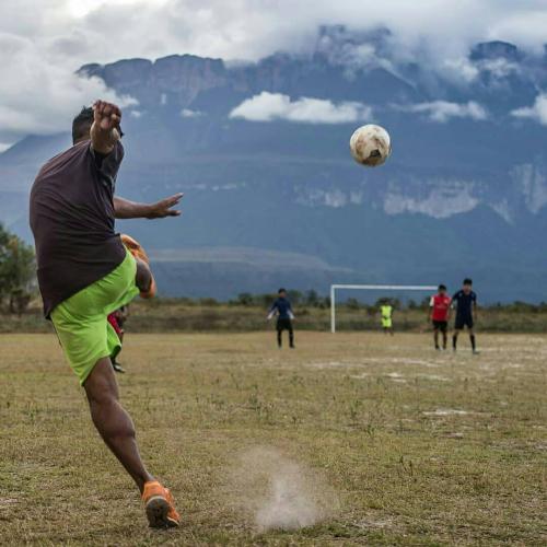 Would you like to enjoy a football match with that landscape in the background?