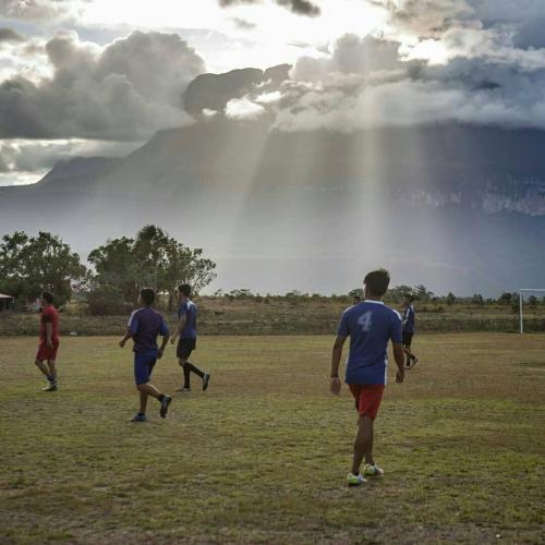 Would you like to enjoy a football match with that landscape in the background?