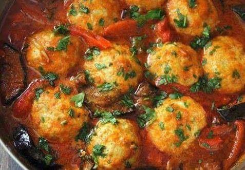 Chicken meatballs in tomato sauce.