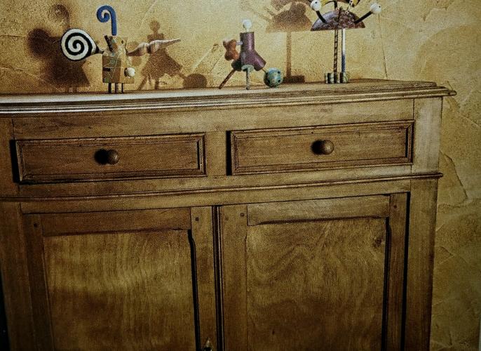 How do you refurbish an old wooden cabinet?