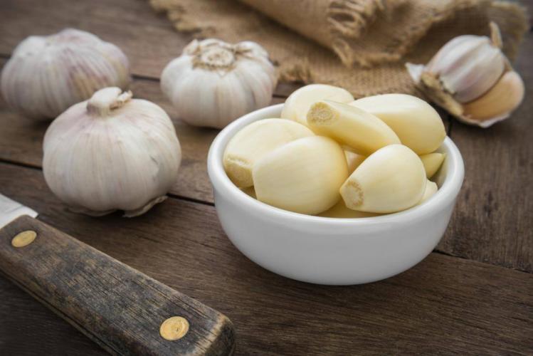 How is garlic grown?