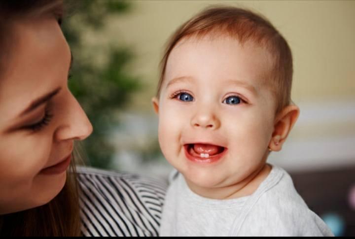 why does baby grind their teeth?