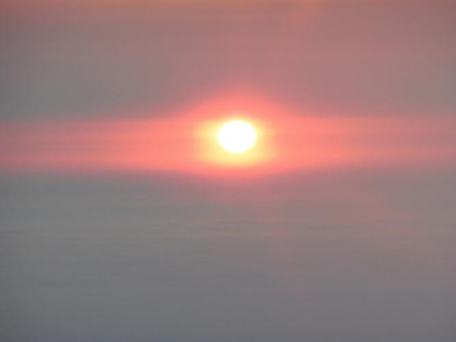 Zonsopkomst vanuit het vliegtuig